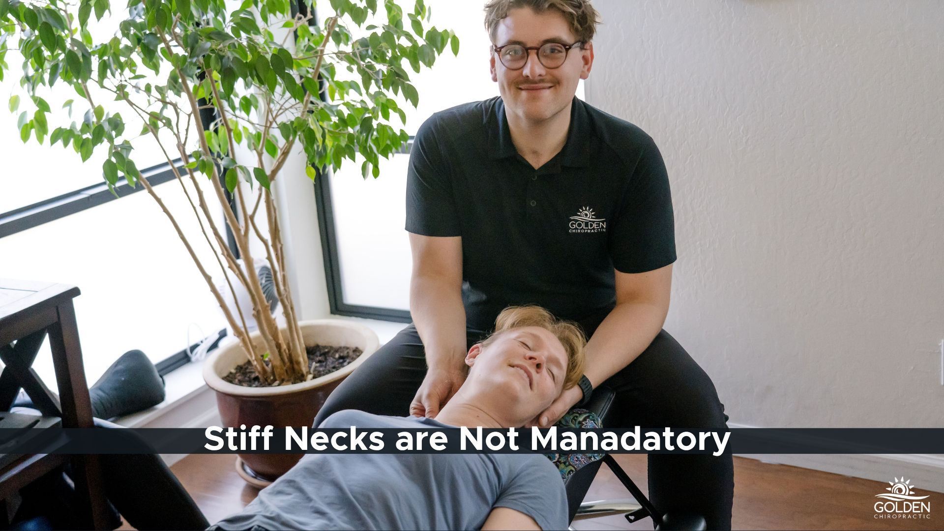 Dr. Joe adjusting the neck of a smiling woman at Golden Chiropractic in Aptos