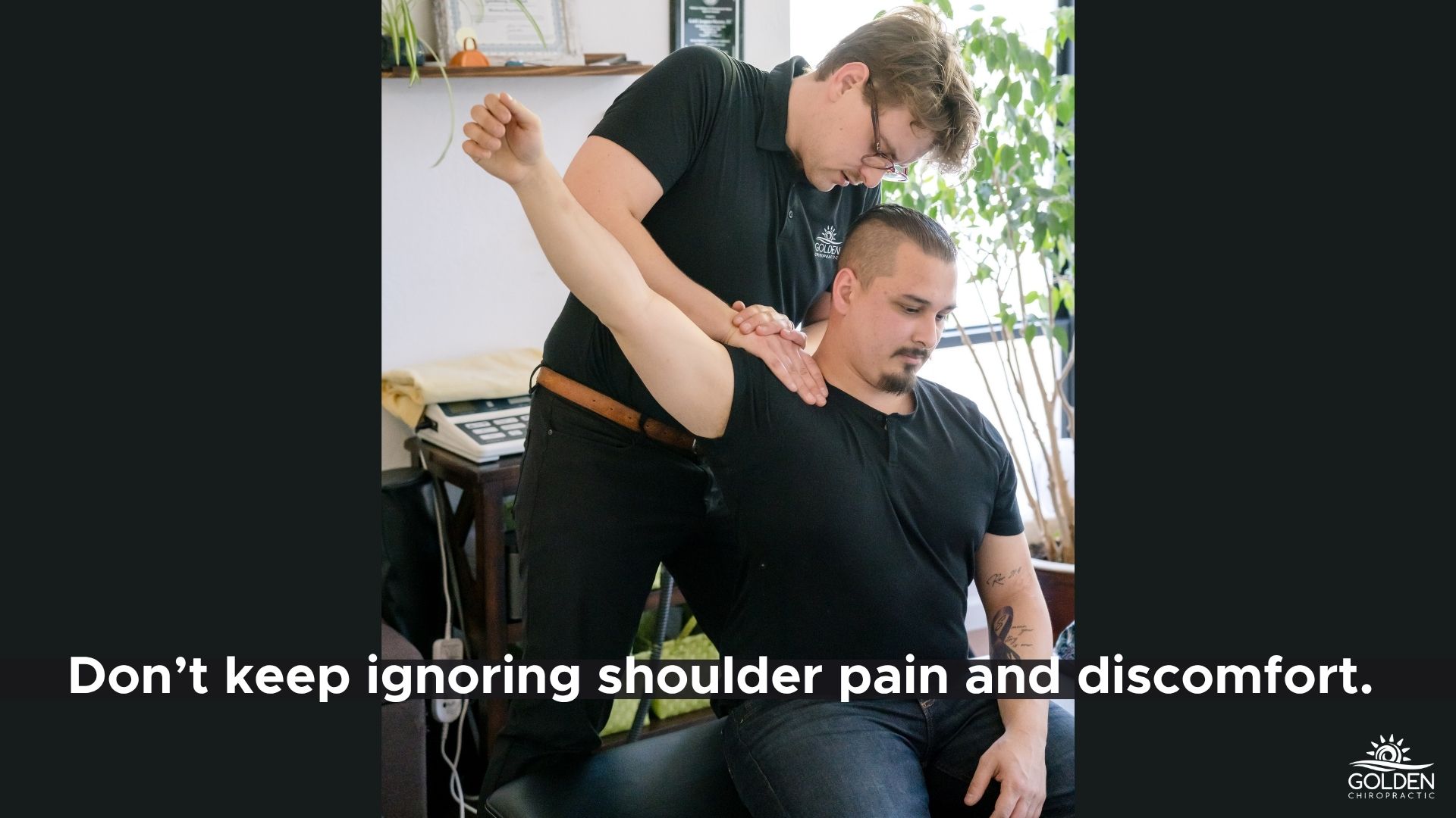 Dr. Joe of Golden Chiropractic in Aptos assessing the shoulder of a manual laborer