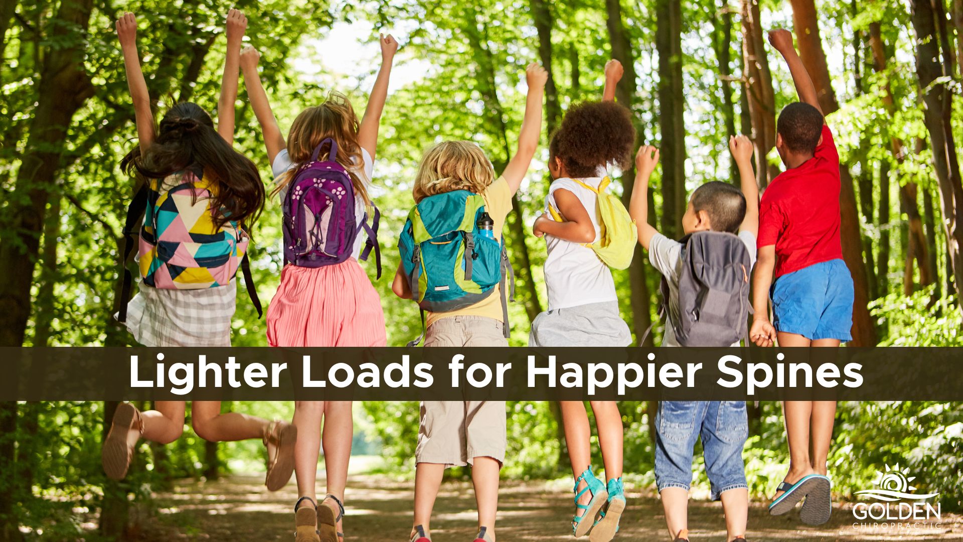 group of children wearing backpacks leaping up together in the woods