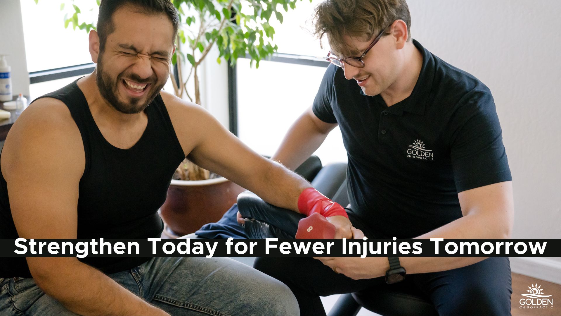 Dr. Joe teaching a wrist strengthening exercise to a male patient