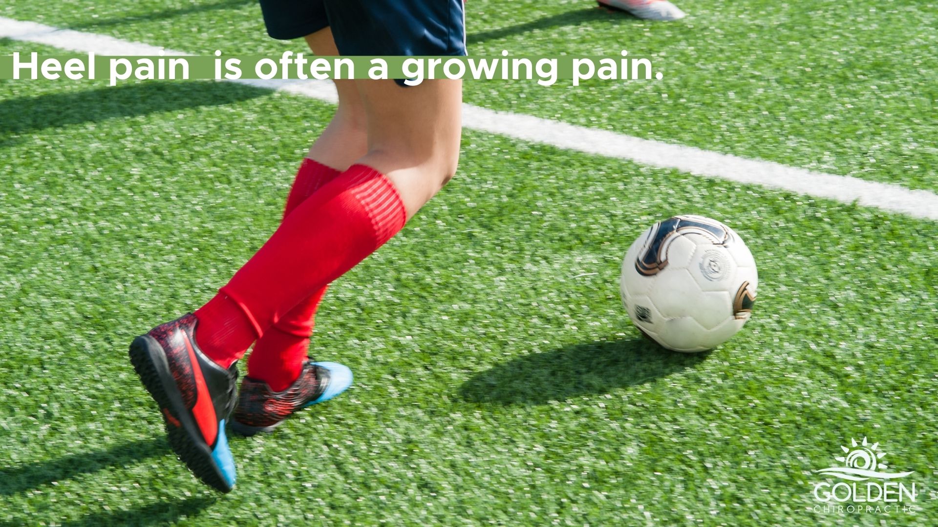 Girls feet and legs in soccer attire getting ready to kick a soccer ball