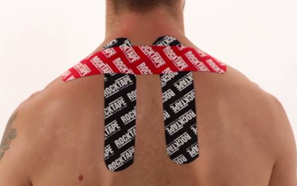 Man with RockTape H pattern on his neck and upper back