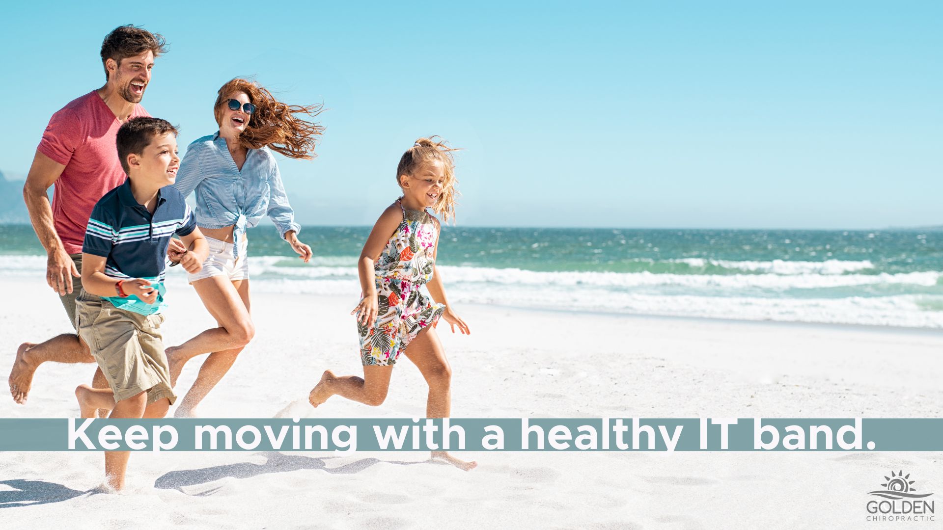 Young family running on the beach and smiling