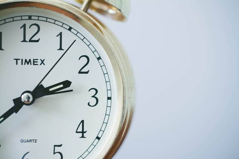 Clock on grey background