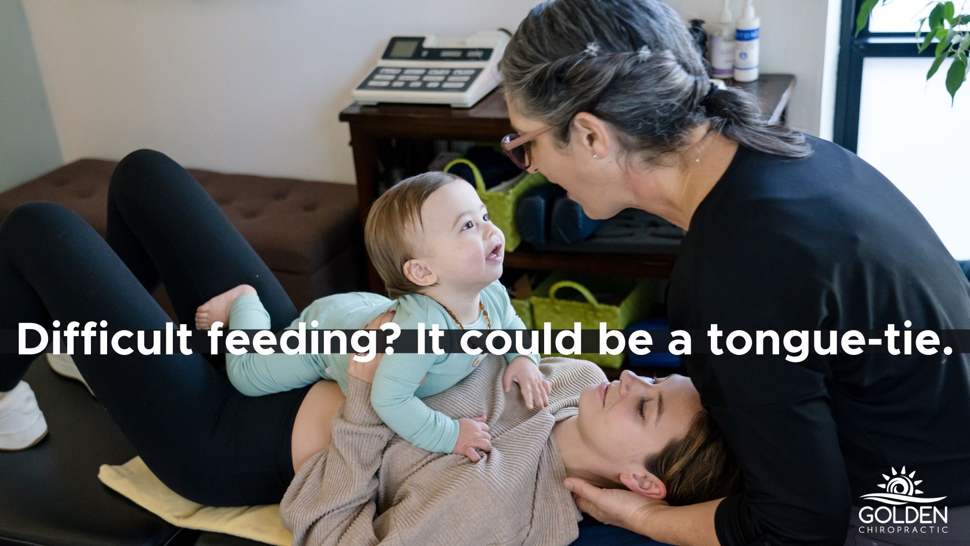 Dr. Goldi treating a mom and an infant at Golden Chiropractic in Aptos