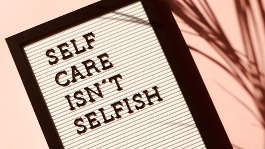 Sign that reads self-care isn't selfish